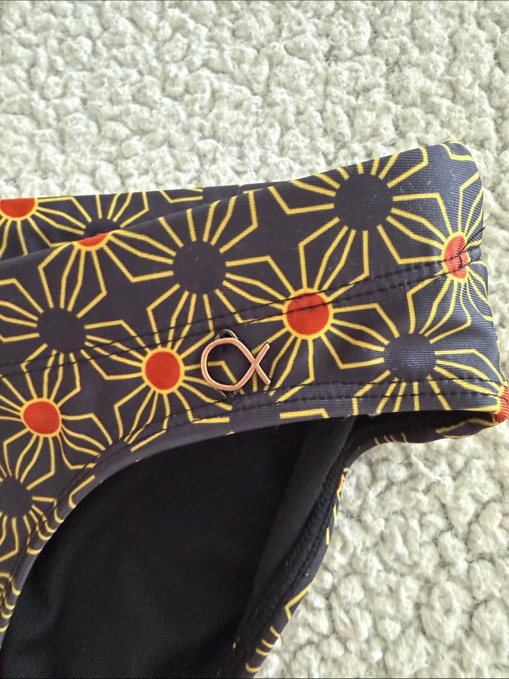 Men's Black Swim Briefs with Orange Starburst Print - Picture 4 of 6
